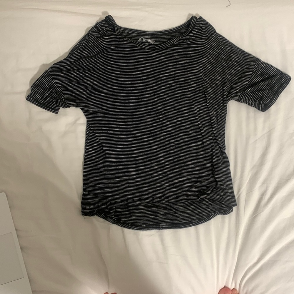 This a loose black and white shirt from art class.